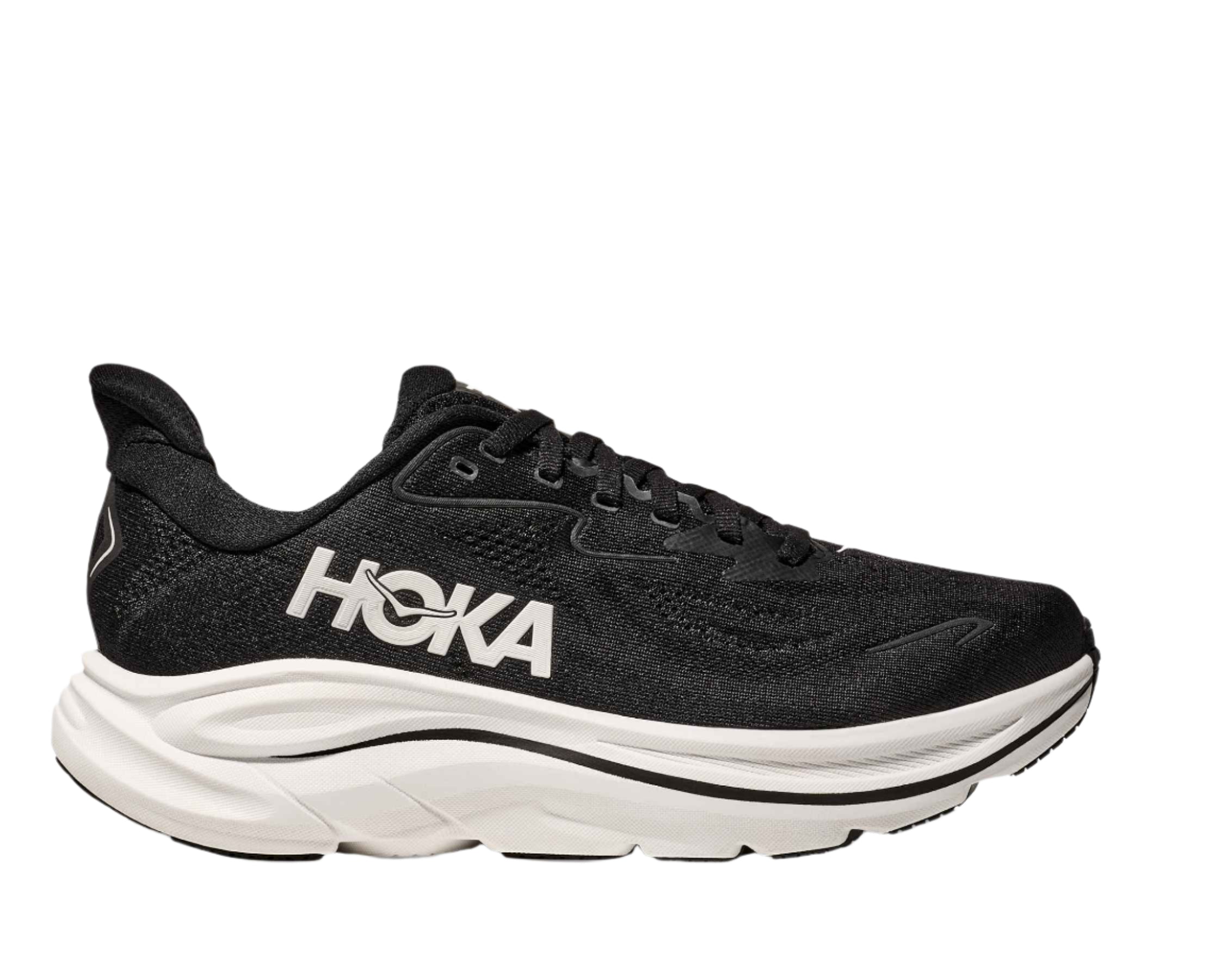 Black shoe with a white sole. hoka logo on the side